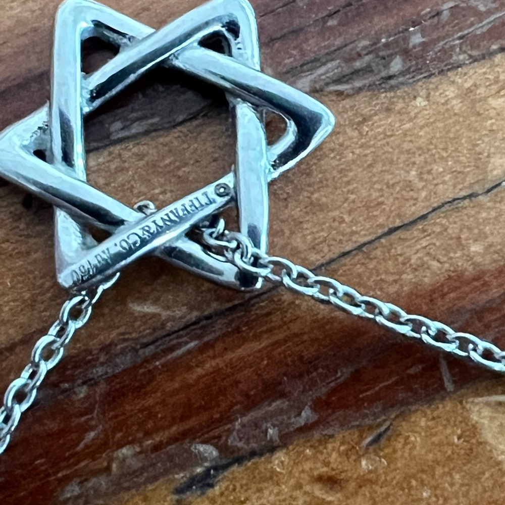 Authentic tiffany sterling silver Star of David with 18 inch Tiffany & Co chain
